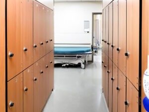 Interior view of Etobicoke General Hospital featuring Spectrum Phenolic Lockers in Tuscan Walnut finish