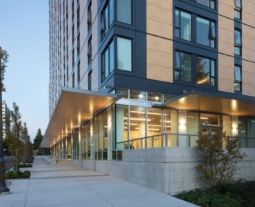 Street level side view of Spectrum Facades on UBC's Brock Commons Student Residence